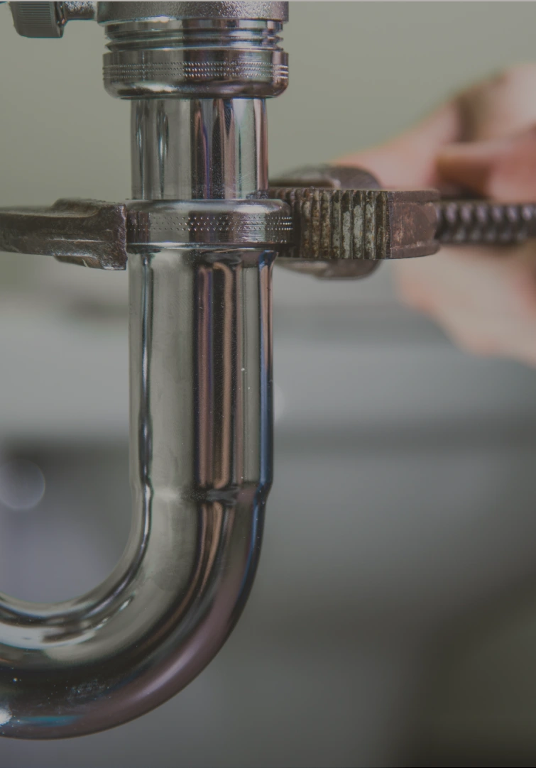 An image of a kitchen tap being fixed